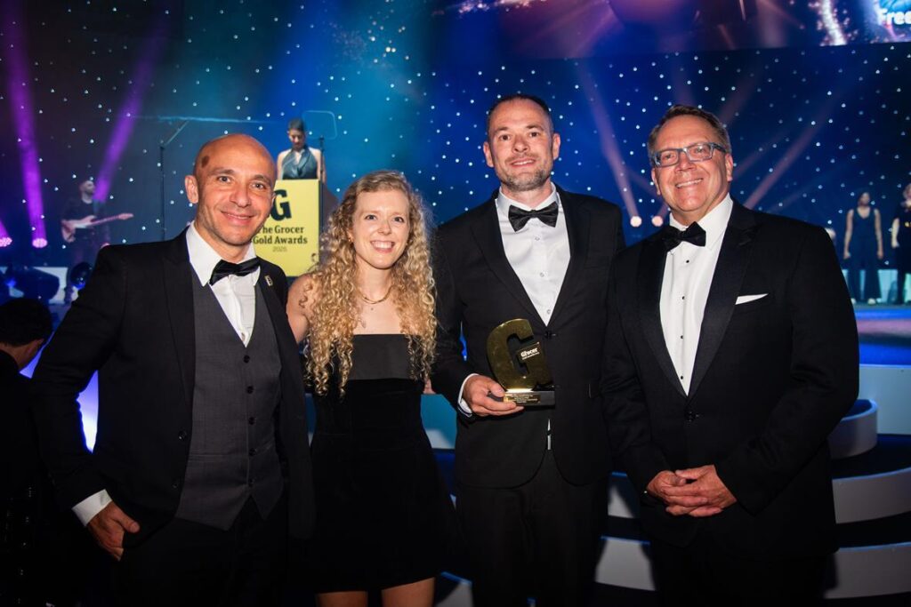 Four Focal Employees wearing tuxes