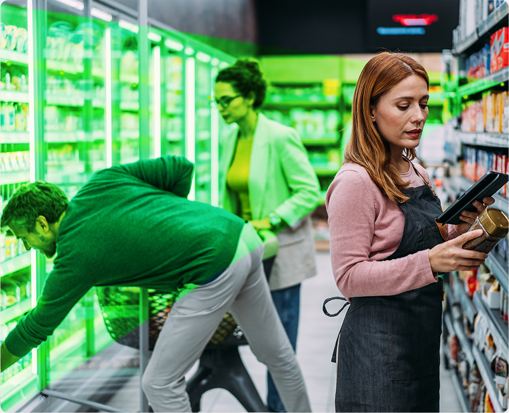 Grocery Store Aisle with clerk scanning item